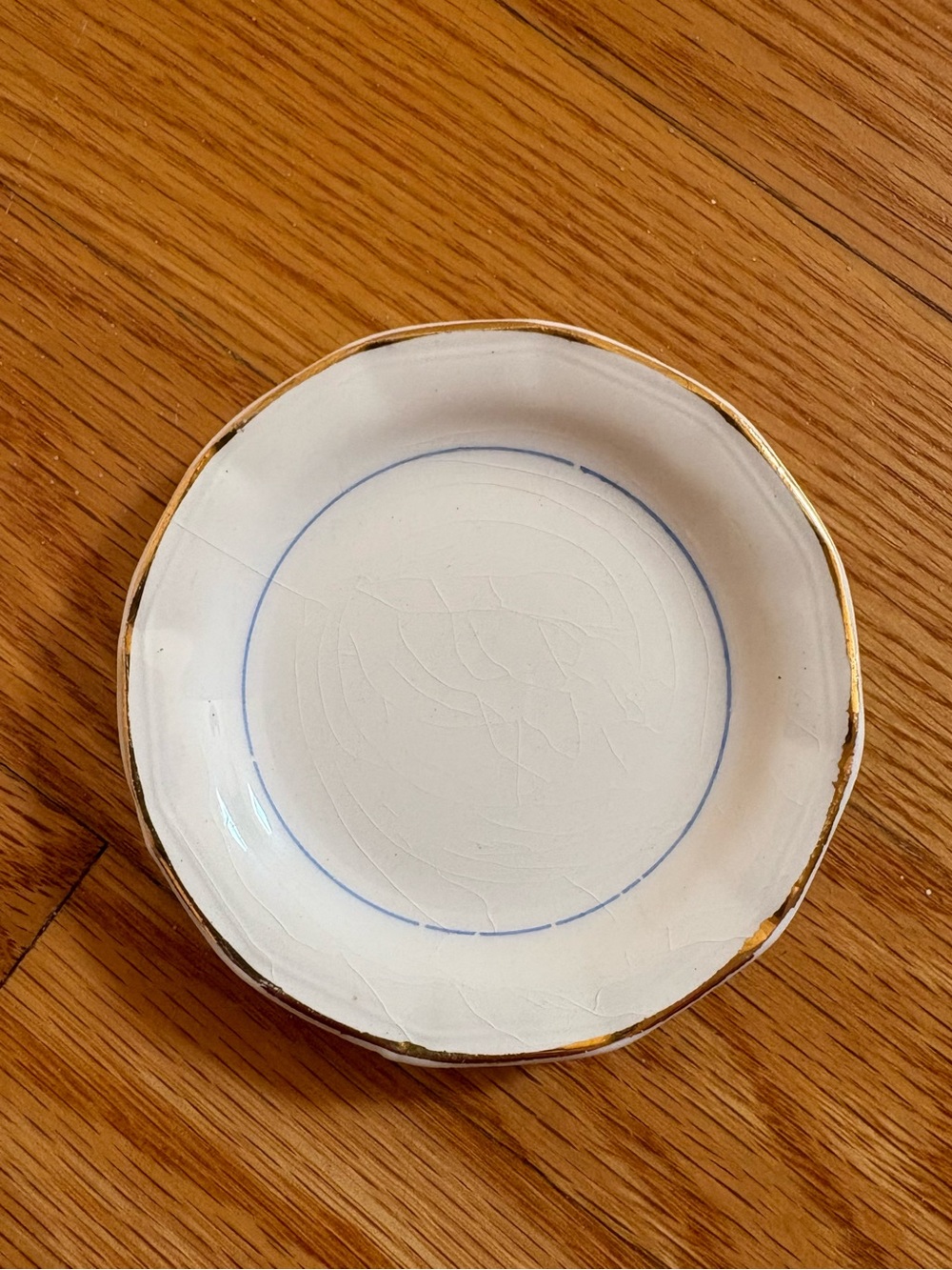 Butter Pat With Crazing Blue line and Gold Rim